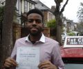 Eloka with Driving test pass certificate